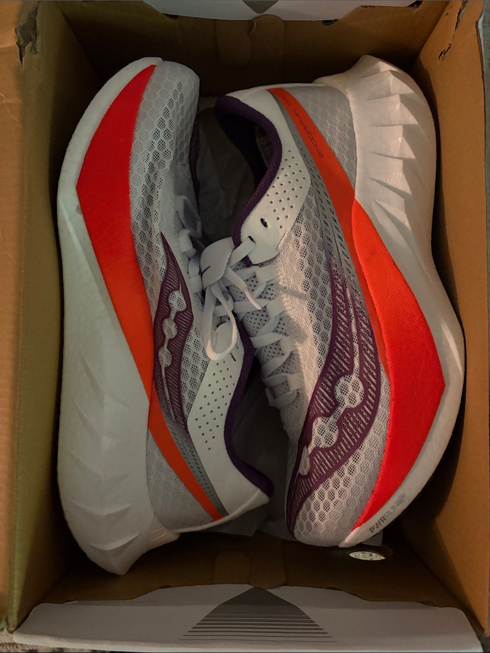 Saucony Women’s White Sneakers with Purple and Orange Accents